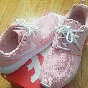 Women's Pink and white Nike Roshe One